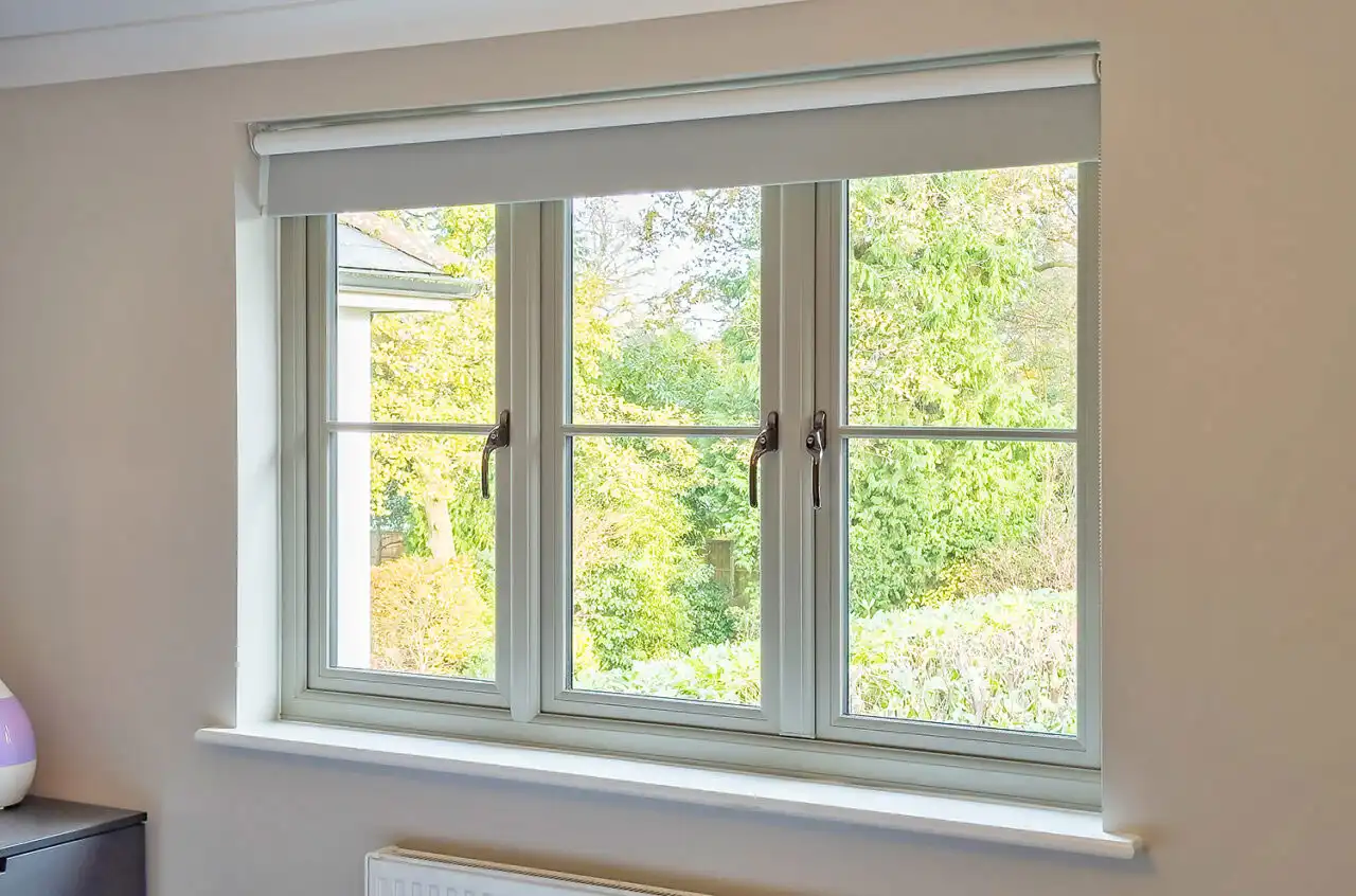 White internal casement window with double glazing and countryside view.