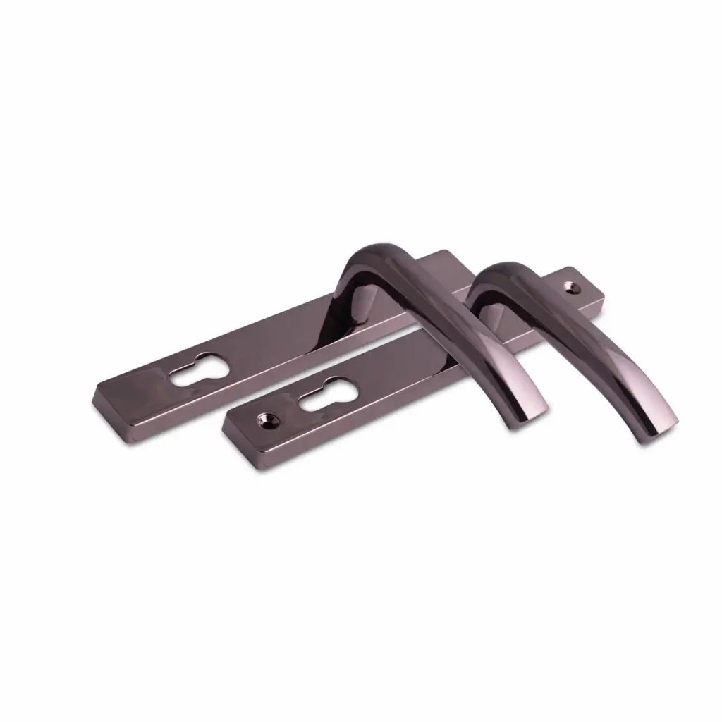 Bronze-finish architectural door handles with rectangular backplates and keyhole cutouts.