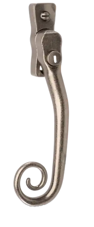 Pewter patina monkey tail window handle with traditional curled end and key lock.